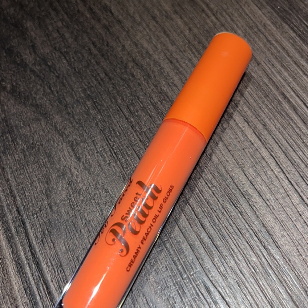 Peach lip gloss by too faced (discontinued)